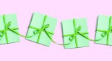 Several gifts set in a row with their ribbons connected.