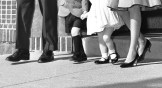A vintage photo of a family leaving church together.
