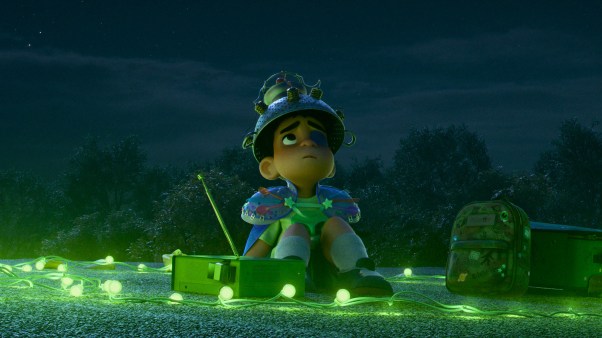 A still from the movie showing Elio looking up at the night sky.