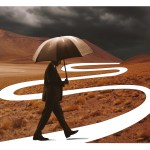 A man walking with an umbrella in the wilderness into a storm.