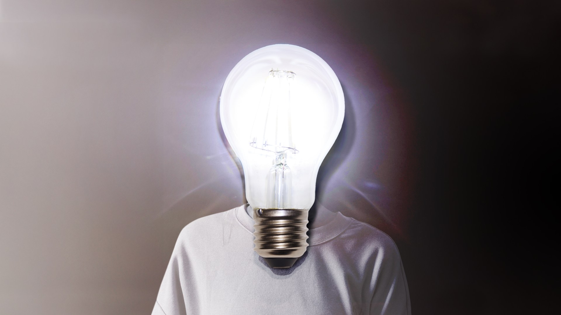 A person with a lightbulb for a head